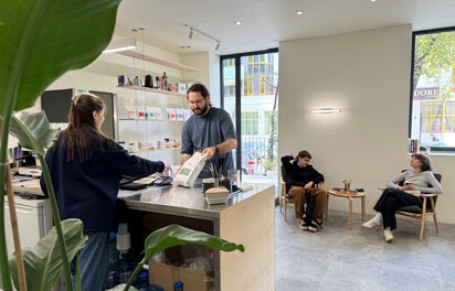 Customer buying coffee beans in Kosmonavtika cafe in Chisinau